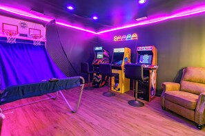 Check out our arcade room with Pac Man, Need for Speed, NBA Jam and Pop-a-shot