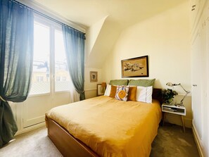 Bedroom with French windows and second bedroom with French windows andbalcony