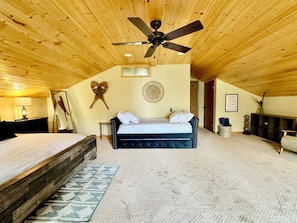 Spacious Primary Bedroom with King bed and Twin Trundle
