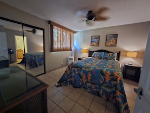 Cozy queen size room with AC to keep cool at night and a full private bathroom.