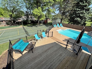 Resort style backyard with pool, pickleball court, putting green, and more!