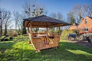 On rainy days and warm weather, this is our Cabana outside with lighting and a heater!
