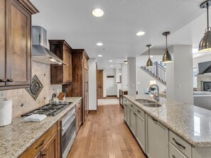 Kitchen: Main floor, Sub-Zero fridge, Wolf oven, Nespresso, toaster, utensils, tableware