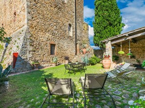 Sky, Property, Furniture, Table, Azure, Chair, Building, Window, Shade, Architecture