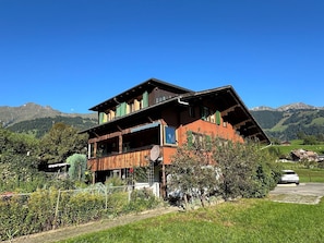 Sky, Plant, Mountain, Natural Landscape, Building, House, Slope, Tree, Tints And Shades, Grassland
