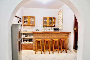 Full kitchen, full refrigerator, microwave, coffee maker, toaster and blender.
