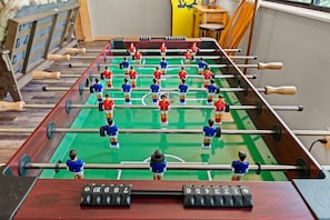 Challenge your family to a friendly game of foosball in the game nook—perfect for laughter-filled evenings and a little friendly competition.