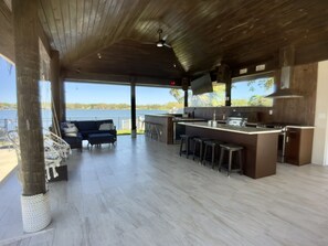 This space includes a built-in grill, ample counter space, and essential cooking tools.