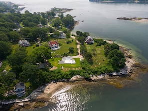 Aerial view as home was being built in 2024 - white foundation.
