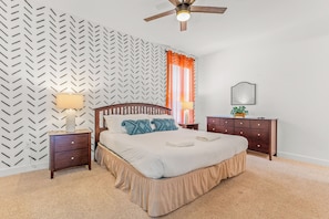This queen suite boasts a private ensuite, ceiling fan & smart TV
