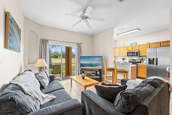 Curl up in the serene living room & stream your favorites on the smart TV