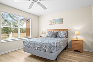 This queen suite boasts an ensuite, smart TV, & ceiling fan