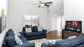 Open living space with TV and sofa sleeper