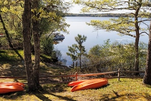 Four kayaks with paddles for your enjoyment.