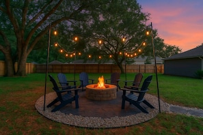 Enjoy the fire pit & twinkle lights, perfect for s'mores & great company.
