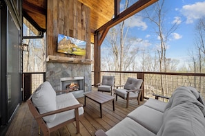 Outdoor Fireplace and TV with Comfortable Seating