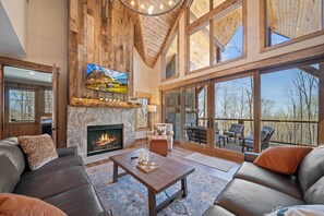 Bright Space with Gas Fireplace, TV and Wall of Windows