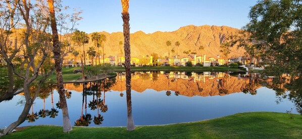 Sunrise view of the mountains & lake from back patio