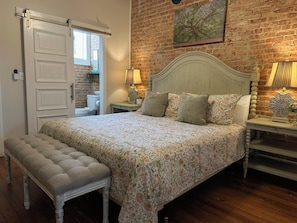 Main bedroom with king bed & adjoining bathroom