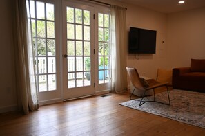 French doors onto deck from living area.
