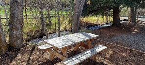 Picnic table by the creek