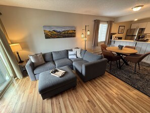 Cozy couch which is great for naps, movie night or watching the game. 