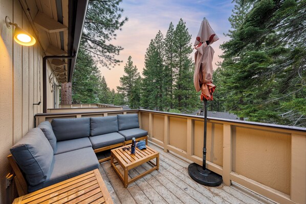 Cozy balcony with forest view.
