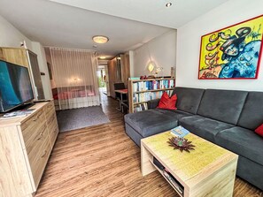 Furniture, Interior Design, Couch, Flooring, Wood, Floor, Ceiling, Living Room, Room