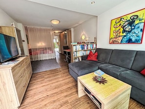 Furniture, Interior Design, Couch, Flooring, Wood, Floor, Ceiling, Living Room, Room