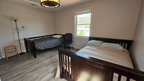 Bedroom with full and twin bed