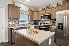 Chef's Kitchen with Stainless Steel Appliances