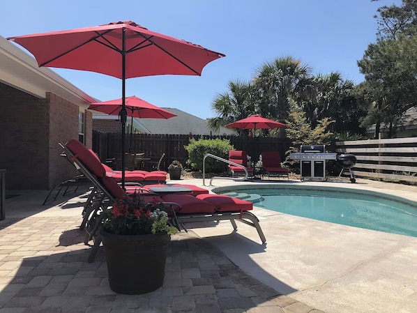 Relax by the pool at Three Palms