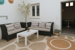 Cozy outdoor patio with seating for relaxing evenings.