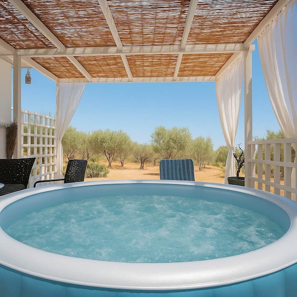 Hot tub area, with a private patio