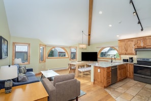 Spacious living room with vaulted ceilings and amazing views of Ballard Peak