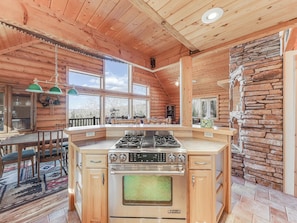 View from the kitchen with newly updated gas stove and oven
