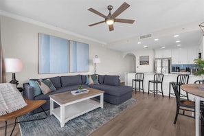Living room, kitchen and dining area.
