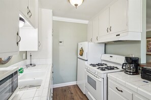 Indoors, Kitchen, Lamp, Appliance, Refrigerator