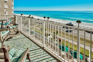 Stunning views from this 4th Floor, Corner-Unit Condo! The perfect place to enjoy your morning coffee or a cold afternoon beverage.