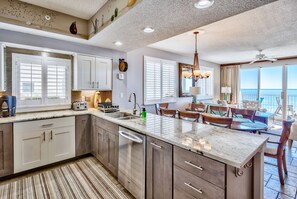 Cook meals in your fully stocked and Remodeled kitchen with Gulf Views - Welcome to your home away from home!