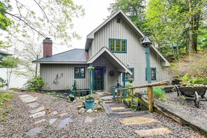 Property Exterior | Spacious Yard | Lake & Mountain Views