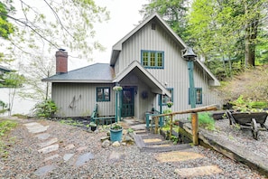 Property Exterior | Spacious Yard | Lake & Mountain Views