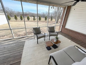 Drink your morning coffee on the screened in porch before hitting the trails