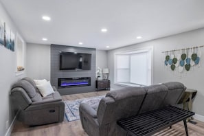 65" Smart TV, Electric Fireplace, Sofa & Loveseat