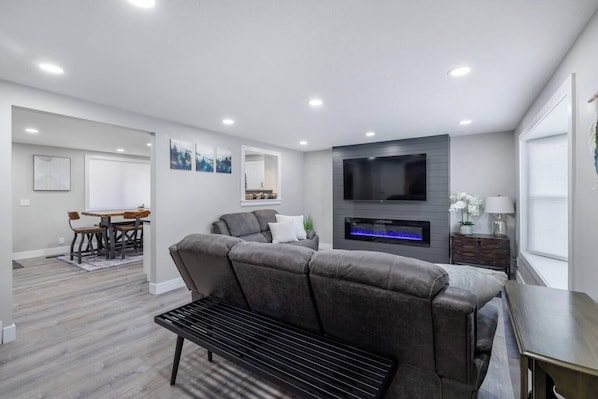 65" Smart TV, Electric Fireplace, Sofa & Loveseat