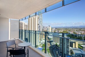 Enjoy your morning coffee in this spacious balcony overlooking the river/city