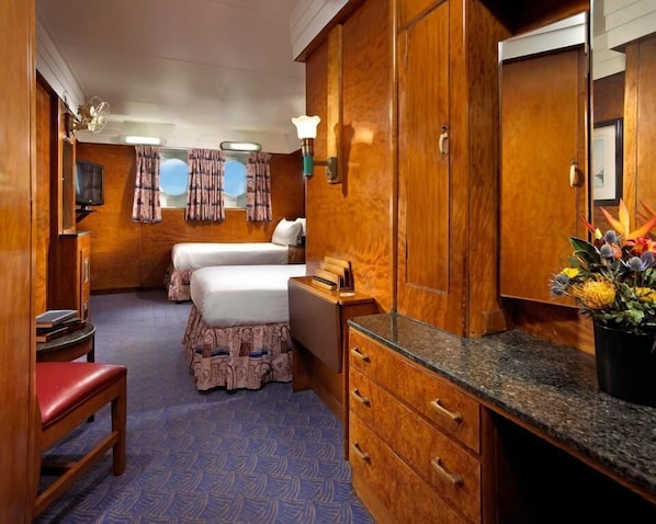 Unit with 2 Twin beds. Exact unit will be assigned upon arrival. Views, colors, and decor may vary.