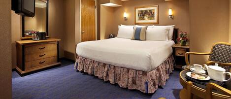 Unit with King bed. Exact unit will be assigned upon arrival. Views, colors, and decor may vary.