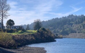 The beautiful Chetco River flows along the edge of our park's property.