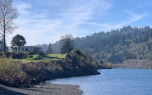 The beautiful Chetco River flows along the edge of our park's property.